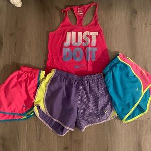 3 pairs of Nike shorts with matching Nike tank